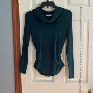 It’s our time-size L-emerald green -cowl neck sweater with rushing on the sides